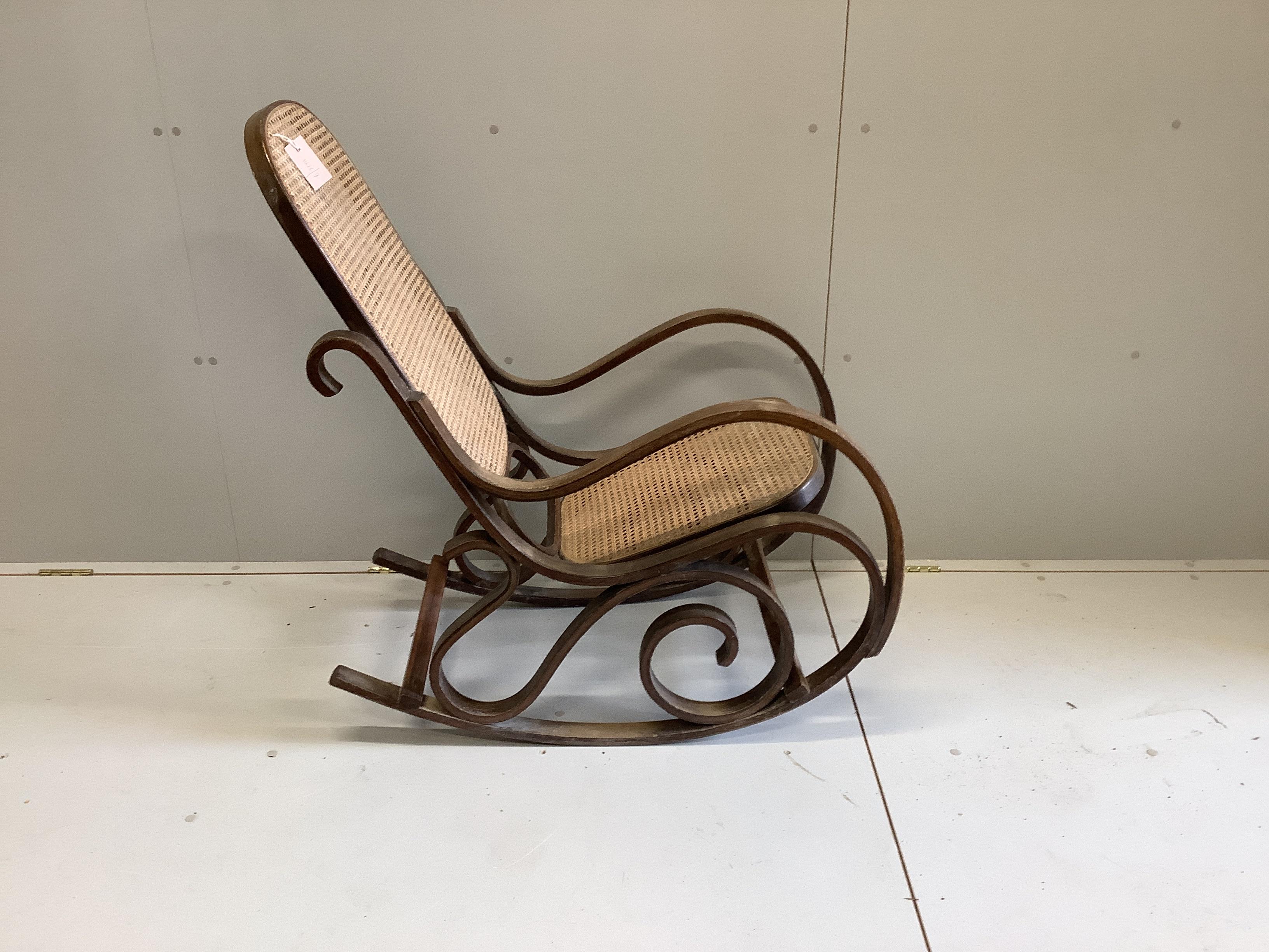 A caned beech bentwood rocking chair, width 49cm, depth 72cm, height 108cm